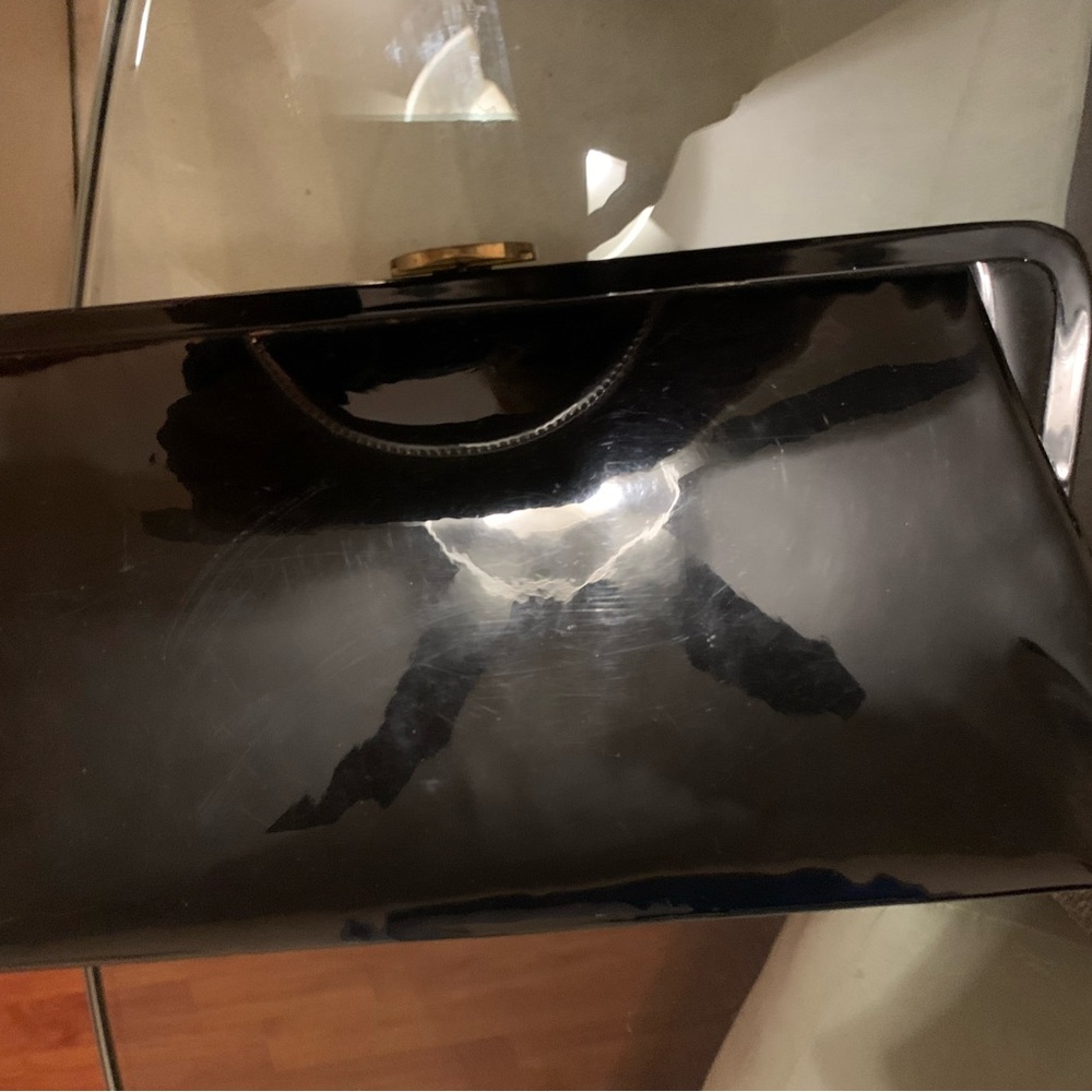 Vintage patent clutch